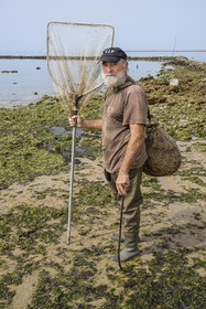 France, Charente Maritime, Oleron island, Saint Georges d'Oléron, Sables Vignier beach at low tide, authorized fisherman at the Basses fish lock