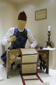 Turkey, Central Anatolia, Ankara, the Ethnographic Museum, calligrapher working on a 19th century Muslim calendar
