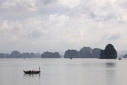 Vietnam, Quang Ninh Province, Halong Bay, listed as World Heritage by UNESCO, fishing boat