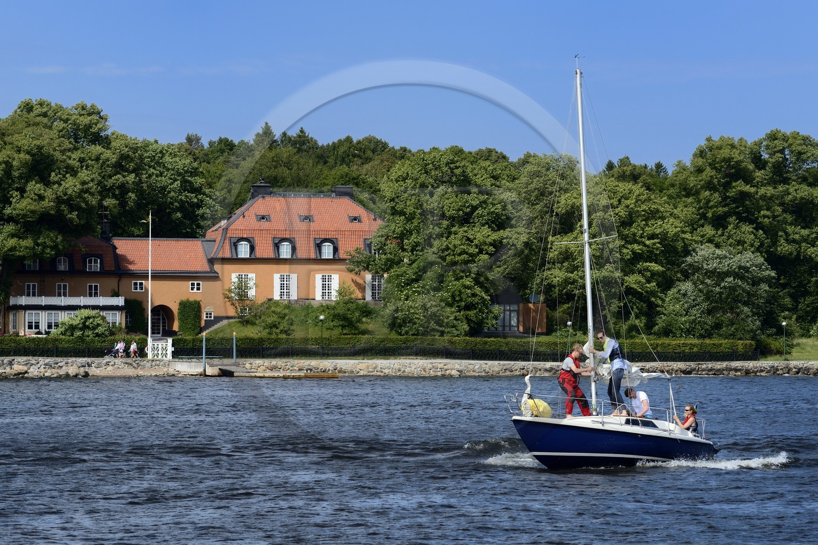 Sweden, Stockholm, Djurgarden, sailboat outside the Carl Johan Bonnier villa