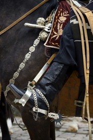 Argentina, Buenos Aires Province, San Antonio de Areco, Tradition Day festival (Dia de Tradicion), silversmith work on silver stirrups used on special occasions by an estanciero (gaucho who owns a ranch)