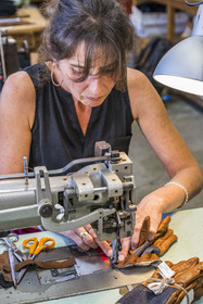 France, Aveyron, Millau, Maison Fabre (Ganterie Fabre), family glove factory founded in 1924, glove english sewing technique on old machines in the workshop