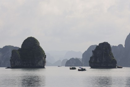 Vietnam, Quang Ninh Province, Halong Bay, listed as World Heritage by UNESCO, fishing boat