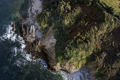 France, Pyrenees Atlantiques, Basque Country coast, Saint-Jean-de-Luz, flysch cliffs, a kind of mille-feuille alternating hard rocks and soft rocks, at the cape between Erromardie beach and Lafitenia beach (aerial view)