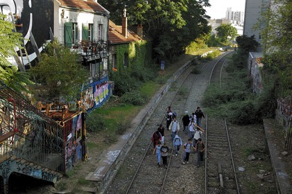 France, Paris, children on the Small Belt (golden arrow) old train line in Menilmontant