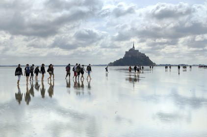 France, Manche, crossing on foot the Bay of Mont Saint Michel, listed as World Heritage by UNESCO