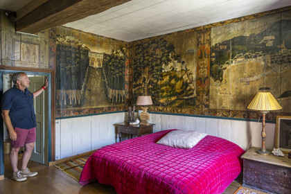 France, Finistère, Roscoff, shipowner's house called la Porte Noire (the Black Gate) built at the end of the 16th century by the James brothers and belonging today to Christian Kulig, master bedroom with murals on wooden partitions  representing Roscoff in the 18th century