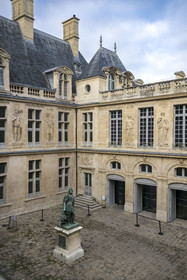 France, Paris, Marais district, Carnavalet Museum, full-length statue of Louis XIV in the court of honor, work of Antoine Coysevox