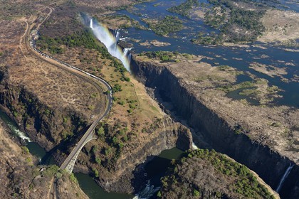Zimbabwe, Matabeleland North Province,  Zambesi River, the Victoria Falls, listed as World Heritage by UNESCO, bridge that marks the border between Zimbabwe and Zambia (aerial view)