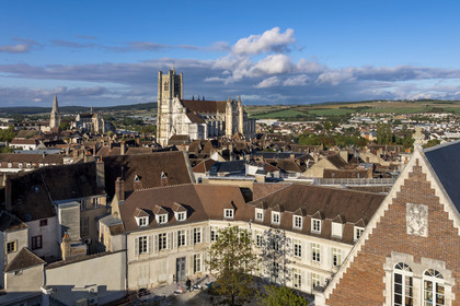 France, Yonne, Auxerre, the Eckmühl room located in the former palace of the Counts of Auxerre and the town hall place du Maréchal Leclerc, Saint-Etienne Cathedral and Saint-Germain Abbey on the banks of the Yonne river in the background (aerial view)