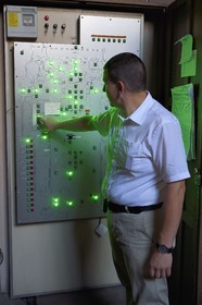 France, Bas Rhin, Strasbourg, old town listed as World Heritage by UNESCO, Notre Dame Cathedral, Sacristan Michel Bolli lights the different areas of the Cathedral from the central electrical panel