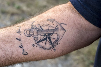 France, Finistère, Iroise Sea, Molene Island, tattoos of Guy Rocher, president of the SNSM station in Molène, Marine anchor