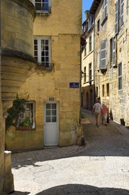 France, Dordogne, Perigord Noir, Dordogne valley, Sarlat la Caneda, house at the corner of rue de la Boetie and Rue Jean Jacques Rousseau, St. Clair Abbey from the 17th century former convent of Poor Clares