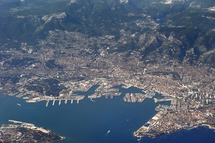 France, Var, the Rade (harbor) of Toulon, the naval base (Arsenal) surrounded by the city and Mount Farron in the background right (aerial view)