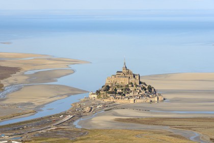 France, Manche, Bay of Mont Saint Michel, listed as World Heritage by UNESCO, Mont Saint Michel at low tide (aerial view)