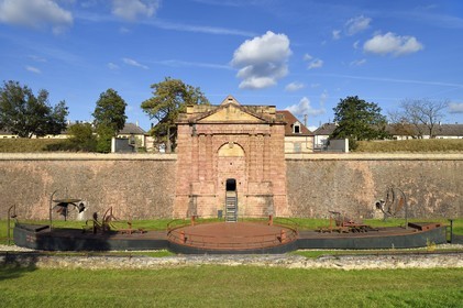 France, Haut-Rhin, Neuf Brisach, town fortified by Vauban, listed as World Heritage by UNESCO, moat and fortifications near the Porte de Belfort to the south-west, the moored barge by artist Helmut Lutz