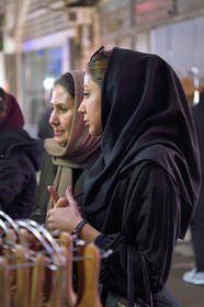 Iran, Isfahan Province, Isfahan, Bazar-e Bozorg (Great Bazaar), young Iranian woman and her mother