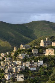 France, Haute Corse, Cap Corse, Rogliano municipality, village of Bettolacce (Bettulace) overlooked by the round Genoese tower della Parocchia, fortified tower of the fifteenth century