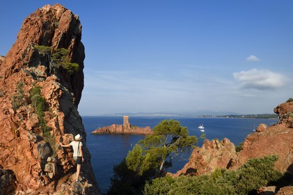 France, Var, Agay area next to Saint-Raphael, Massif de l'Esterel (Esterel Massif), the Corniche d'Or, the ile d'Or island tower next to the Dramont cape