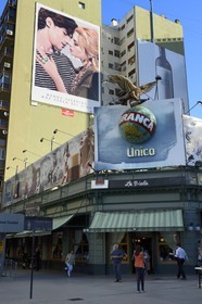 Argentina, Buenos Aires, La Recoleta district, advertising billboards and cafe