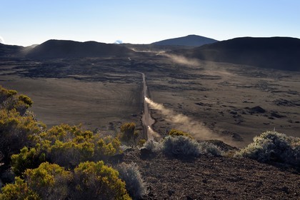 France, Reunion island (French overseas department), Reunion National Park listed as World heritage by UNESCO, on the slopes of the Piton de la Fournaise volcano, hike of the Ste Therese oratory path above the Plaine des Sables that we can see below
