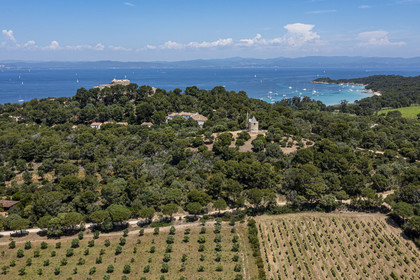France, Var, Iles d'Hyeres, Parc National de Port Cros (National park of Port Cros), Porquerolles island, the windmill of Porquerolles overlooked by the castle Sainte-Agathe (aerial view)