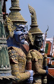 Thailand, Bangkok, Wat Phra Kaew Temple located in the Royal Palace enclosure, monumental and phantasmagorical statues guarding doors