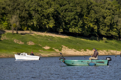 France, Nievre, Regional Natural Park of Morvan, Chaumard, Pannecière lake, fishing on a boat