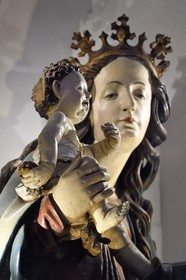 France, Haut Rhin, the Alsace Wine Route, Thann, the 14th century Saint-Thiebaut Collegiate Church, Madonna of the vine growers dating from 1510, little Jesus hides a bunch of grapes in his hand