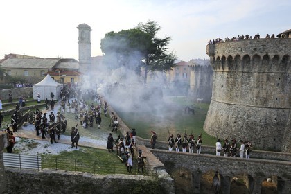 Italy, Liguria, Sarzana, Napoleon Festival, street battles between french soldiers of the Grand Armée and austrian soldiers towards the citadel (fortress Firmafede)
