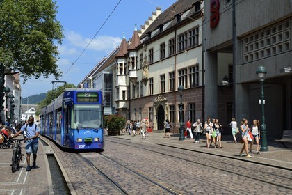 Germany, Baden-Wurttemberg, Freiburg im Breisgau, tram on the street Kaiser-Joseph Strasse and Basler Hof in the background right