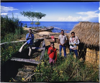 Burundi, Rumonge Province, group of fishermen on Lake Tanganyika, fishermen are exclusively Hutu and come down from the  hills to settle in temporary huts for at least 6 months, fishing is generally done at night with lampara and it's mainly ndagalas (fried fish) mukekes and Lates niloticus (4x5 reversal film reproduction)