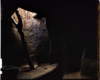 Burkina Faso, Poni province, Lobi land, Loropéni, inside a Lobi house, one of the many interior accesses to the terrace by a ladder carved from a tree trunk