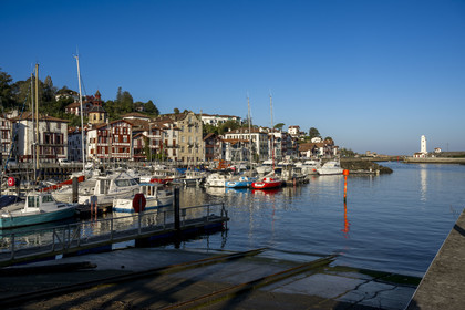 France, Pyrenees Atlantiques, Basque Country coast, Ciboure, the birthplace of Maurice Ravel (in stone) and the bell tower of the Saint-Vincent church on the edge of the port