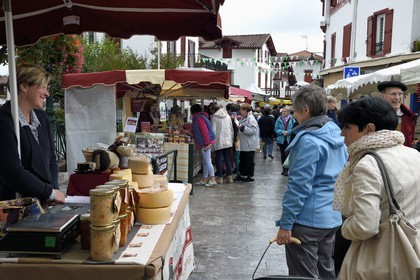 France, Pyrenees Atlantiques, Basque Country, Cambo les Bains, market day, selling cheese
