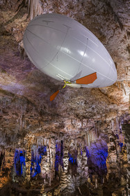 France, Gard, Mejannes-le-Clap, grotte de La Salamandre (Salamander cave), discovery of the cave in Aéroplume®, an individual dirigible balloon inflated with helium which allows you to fly away by flapping your wings