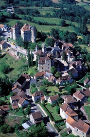 France, Correze, Curemonte village, labelled Les Plus Beaux Villages de France (The Most Beautiful Villages of France), the village and the castle (aerial view)