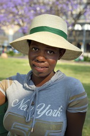 Zimbabwe, Harare, African Unity Square (formerly Cecil Square), young girl wearing a hat