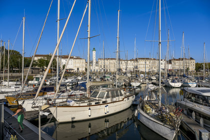 France, Charente Maritime, La Rochelle, the wet dock of the Old Port and its lighthouse