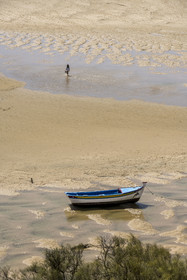 Portugal, Algarve, Ria Formosa Nature Park, Tavira, boat in the front of the fortress of the village of Cacela Velha