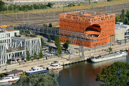 France, Rhone, Lyon, La Confluence new district in the South of the Presqu'ile (Peninsula), Quai Rambaud, the Orange Cube by Dominique Jakob and Brendan MacFarlane architects and the Radio Espace headquarters on the left