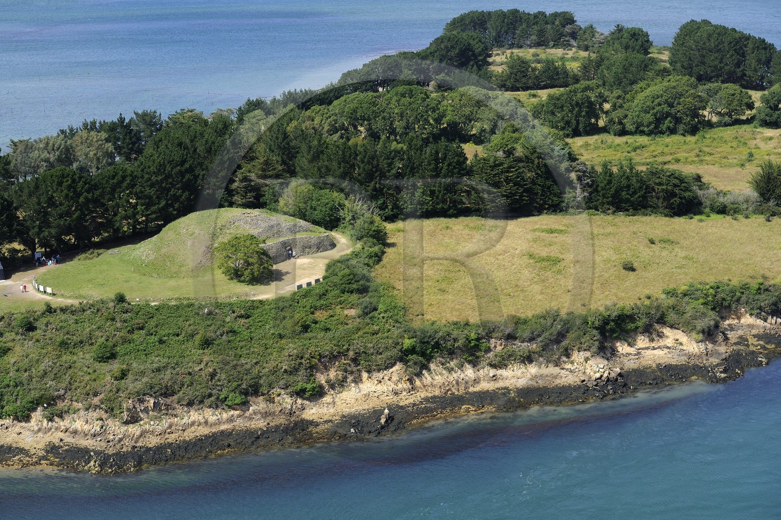 France, Morbihan, Gulf of Morbihan (Golfe du Morbihan), Gavrinis island, Gavrinis cairn megalithic monument (aerial view)