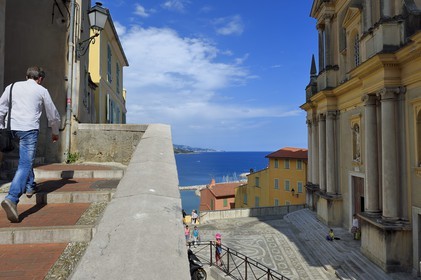 France, Alpes-Maritimes, Menton, old town, the parvis Saint-Michel and the basilique Saint Michel Archange (Saint Michael the Archangel Basilica) right