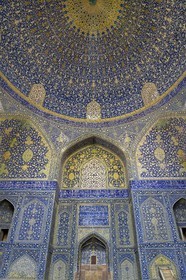 Iran, Isfahan Province, Isfahan, the Shah Mosque also known as Imam Mosque, interior view of the lofty dome covered with polychrome tiles, intended to give a sense of heavenly transcendence