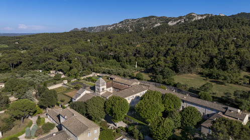 France, Bouches du Rhone, Regional Natural Park of the Alpilles, Saint Remy de Provence, Saint-Paul-de-Mausole monastery, where Van Gogh was interned in 1889-1890, at the foot of the Alpilles massif (aerial view)