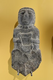 France, Ille-et-Vilaine, Rennes, building of Champs Libres from architect Christian de Portzamparc, the Brittany Museum (Musée de Bretagne), Celtic art, character with lyre which might be the representation of a bard, second Iron Age