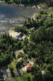 Suède, Comté de Västerbotten, maisons sur la côte vers Umea