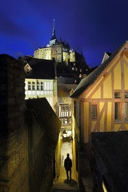 France, Manche, Mont Saint Michel, listed as World Heritage by UNESCO, stairs leading to the Grande Rue from the ramparts of the Abbey
