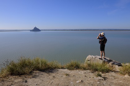 France, Manche, Bay of Mont Saint Michel, listed as World Heritage by UNESCO, the Mount seen from Tombelaine Island