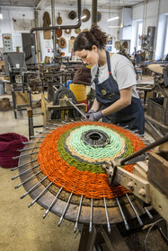 France, Drome, Drome provencale, Nyons, La Scourtinerie, the last scourtin factory in Provence, traditional filters used in the production of olive oil but also designed today as decorative objects made of coconut fiber, manufacturing of scourtins in their workshop on custom-made circular looms